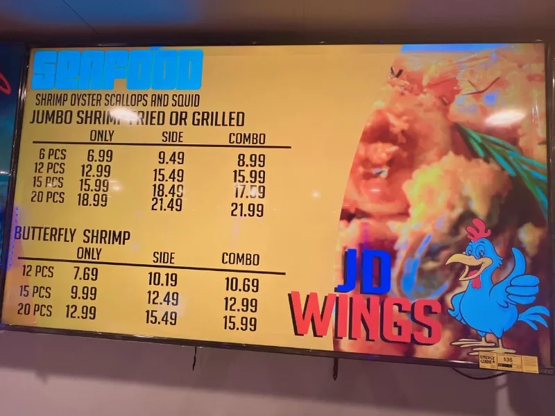 Seafood menu showing shrimp and butterfly shrimp prices at JD WINGS, an Fast food Restaurant in Columbus